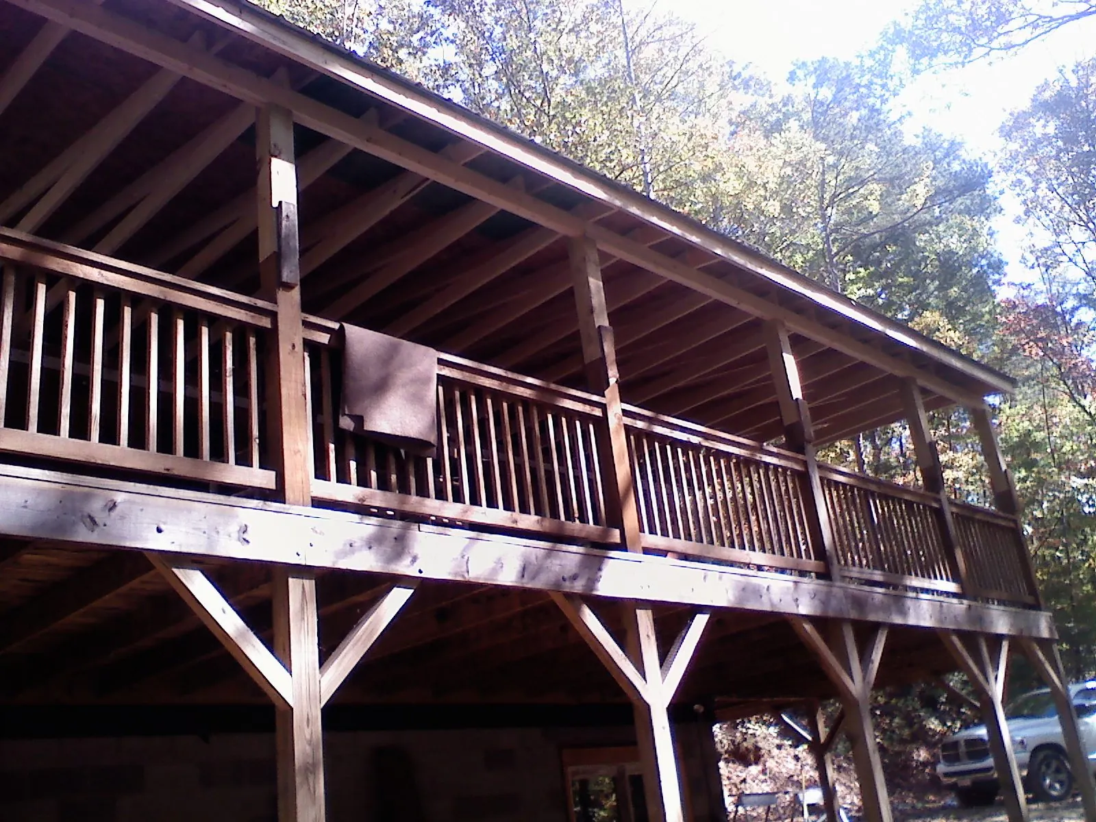 Timber framing under a new elevated porch and deck — Roof Leak Repair in Woody Creek by Roofing Brothers